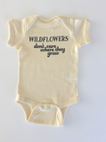 WILDFLOWERS DON'T CARE WHERE THEY GROW